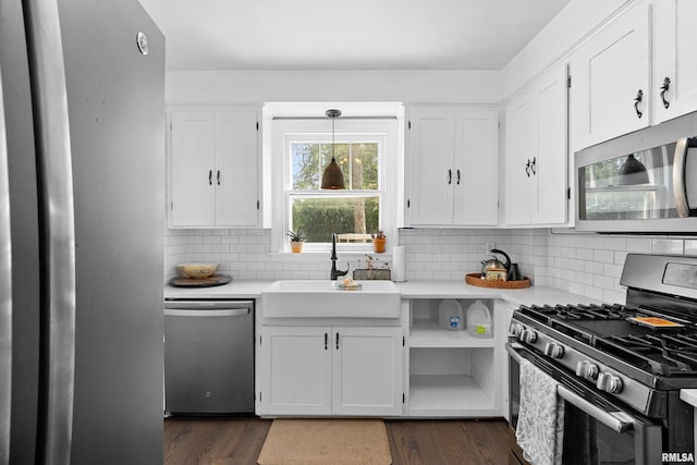 136 E Oak Park Dr, Peoria, IL 61614 - kitchen featuring appliances with stainless steel finishes, light countertops, and white cabinetry