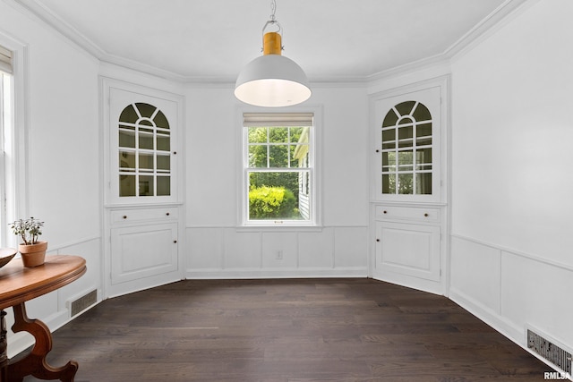 136 E Oak Park Dr, Peoria, IL 61614 - unfurnished dining area with dark wood-type flooring, wainscoting, a decorative wall, and ornamental molding