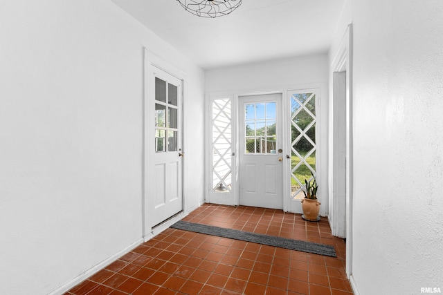 136 E Oak Park Dr, Peoria, IL 61614 - entryway with dark tile patterned flooring