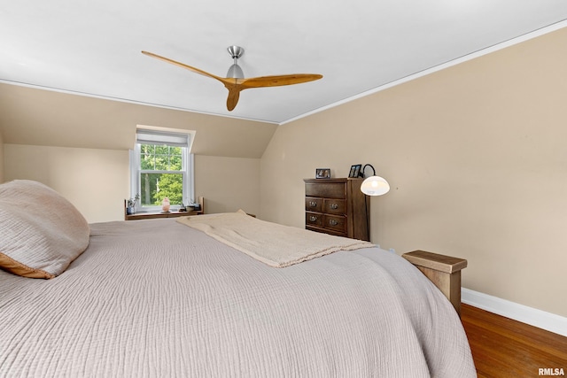136 E Oak Park Dr, Peoria, IL 61614 - bedroom featuring wood finished floors, lofted ceiling, and a ceiling fan
