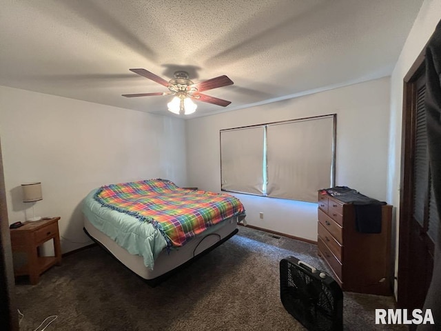 510 W Kelly St, Macomb, IL 61455 - carpeted bedroom with a ceiling fan
