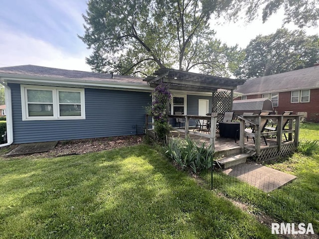 510 W Kelly St, Macomb, IL 61455 - rear view of house with a lawn and a deck