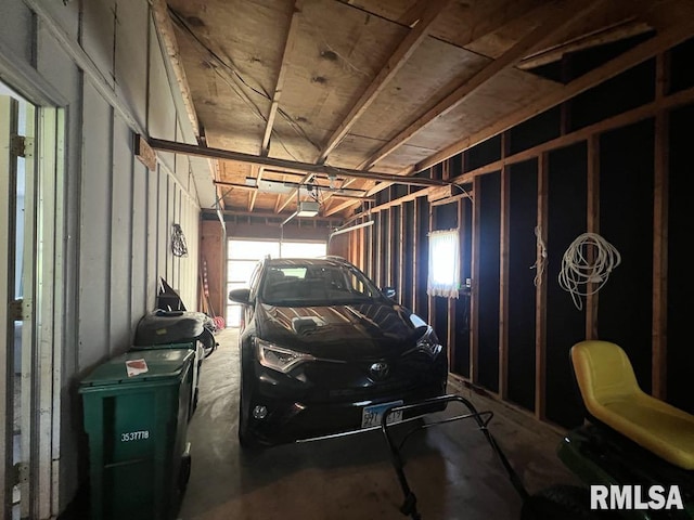 510 W Kelly St, Macomb, IL 61455 - garage featuring a garage door opener