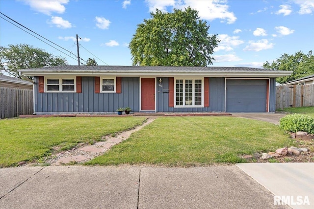 1810 Windsor St, Pekin, IL 61554 - ranch-style home with an attached garage, board and batten siding, and driveway