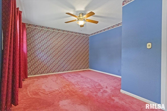 1810 Windsor St, Pekin, IL 61554 - carpeted empty room featuring a ceiling fan and baseboards