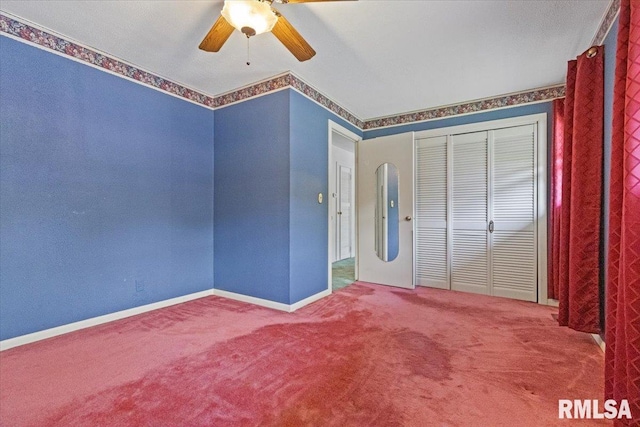 1810 Windsor St, Pekin, IL 61554 - unfurnished bedroom with carpet floors, a closet, and a ceiling fan