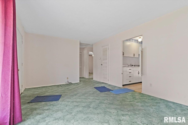 1810 Windsor St, Pekin, IL 61554 - spare room featuring light carpet