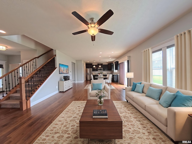 308 Pocono Ave, Morton, IL 61550 - living room with wood finished floors, a ceiling fan, stairs, and recessed lighting