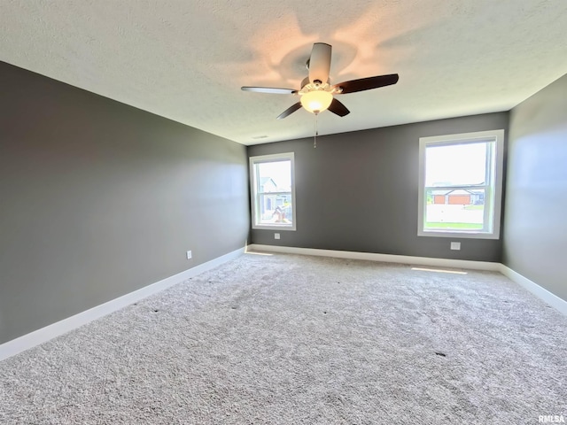 308 Pocono Ave, Morton, IL 61550 - empty room with ceiling fan, a textured ceiling, and carpet flooring