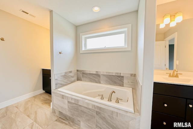308 Pocono Ave, Morton, IL 61550 - bathroom with vanity, a garden tub, and marble finish floors