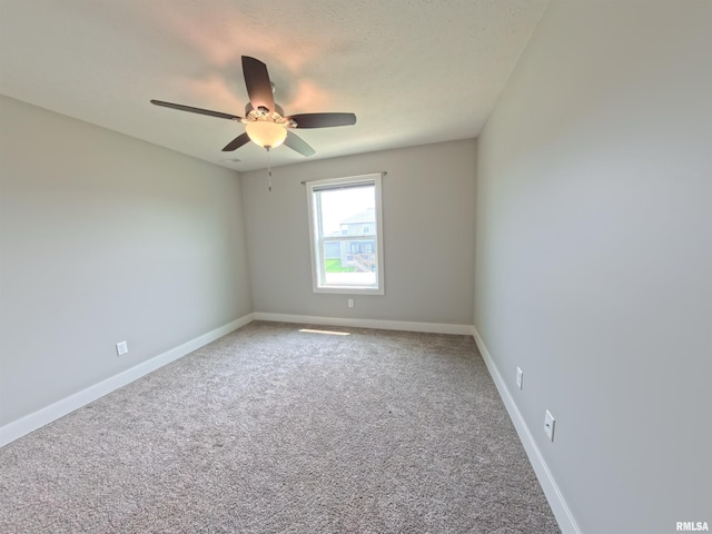 308 Pocono Ave, Morton, IL 61550 - carpeted spare room featuring a ceiling fan and baseboards