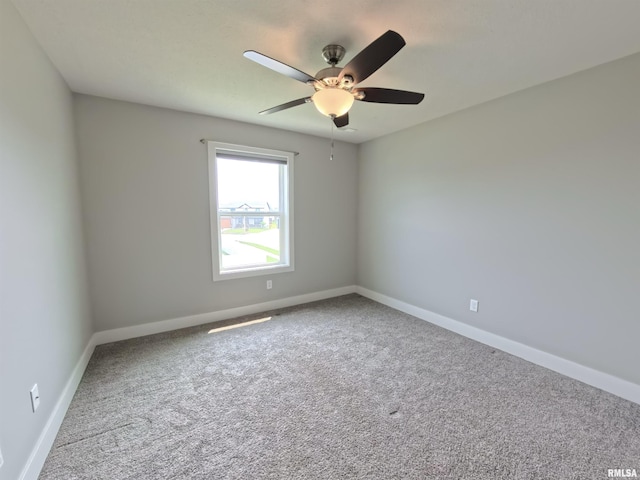 308 Pocono Ave, Morton, IL 61550 - carpeted spare room featuring baseboards and a ceiling fan
