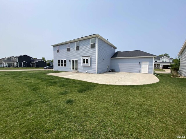 308 Pocono Ave, Morton, IL 61550 - rear view of house with a patio and a lawn