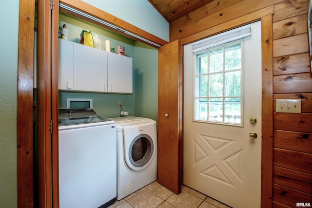7019 Oak Run Dr, Dahinda, IL 61428 - laundry room featuring washing machine and dryer, cabinet space, light tile patterned floors, and wood ceiling