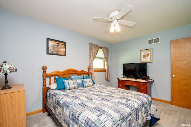 7019 Oak Run Dr, Dahinda, IL 61428 - bedroom featuring light carpet and ceiling fan
