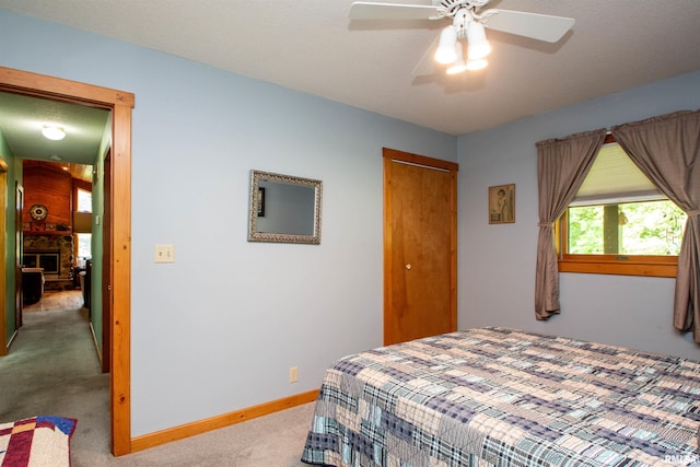 7019 Oak Run Dr, Dahinda, IL 61428 - carpeted bedroom featuring a closet and ceiling fan