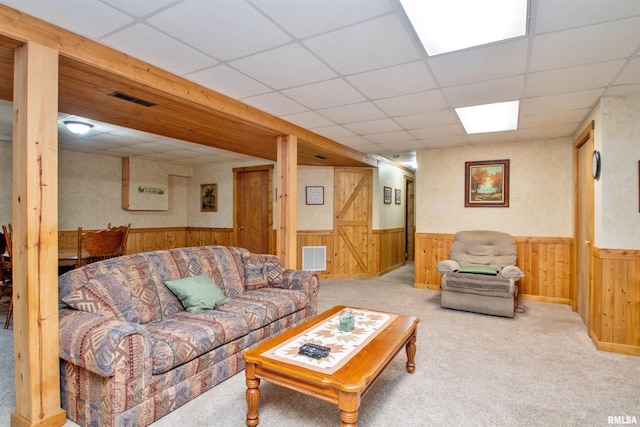 7019 Oak Run Dr, Dahinda, IL 61428 - living area with wainscoting, carpet, a drop ceiling, and wooden walls