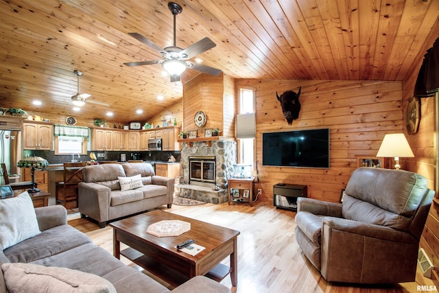 7019 Oak Run Dr, Dahinda, IL 61428 - living room featuring lofted ceiling, ceiling fan, healthy amount of natural light, light wood-style floors, and wooden ceiling