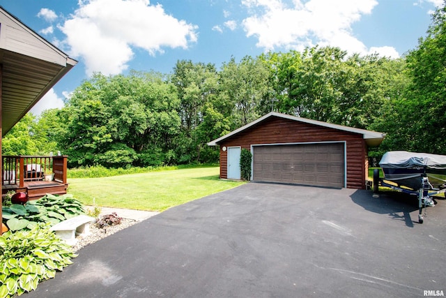 7019 Oak Run Dr, Dahinda, IL 61428 - detached garage with view of wooded area
