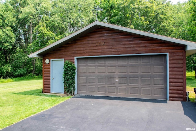 7019 Oak Run Dr, Dahinda, IL 61428 - detached garage with a forest view
