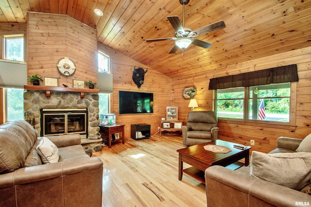 7019 Oak Run Dr, Dahinda, IL 61428 - living area with wooden walls, wooden ceiling, wood finished floors, ceiling fan, and high vaulted ceiling
