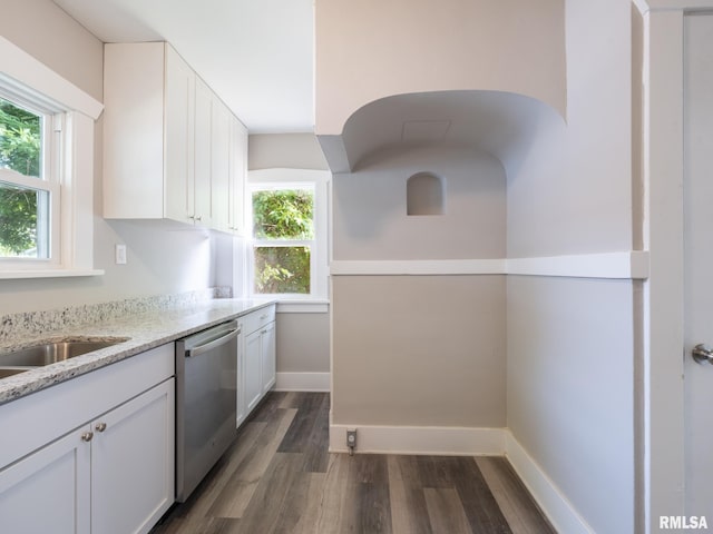 600 E Virginia Ave, Peoria, IL 61603 - kitchen featuring stainless steel dishwasher, dark wood-style floors, light stone countertops, and plenty of natural light