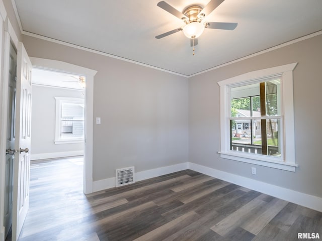 600 E Virginia Ave, Peoria, IL 61603 - empty room featuring ornamental molding, a ceiling fan, and dark wood-style floors