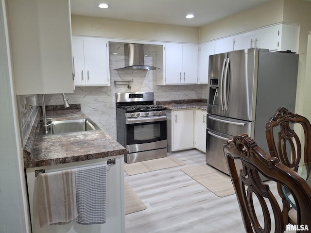 2604 W Kansas St, Peoria, IL 61604 - kitchen featuring wall chimney exhaust hood, appliances with stainless steel finishes, dark countertops, tasteful backsplash, and recessed lighting
