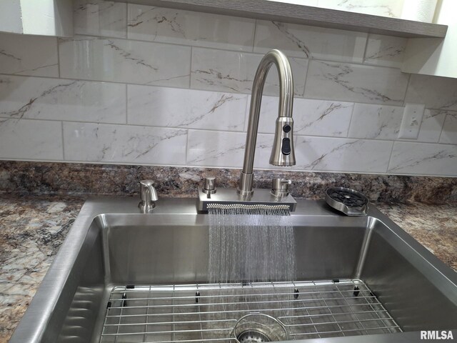 2604 W Kansas St, Peoria, IL 61604 - kitchen view of a sink and tasteful backsplash