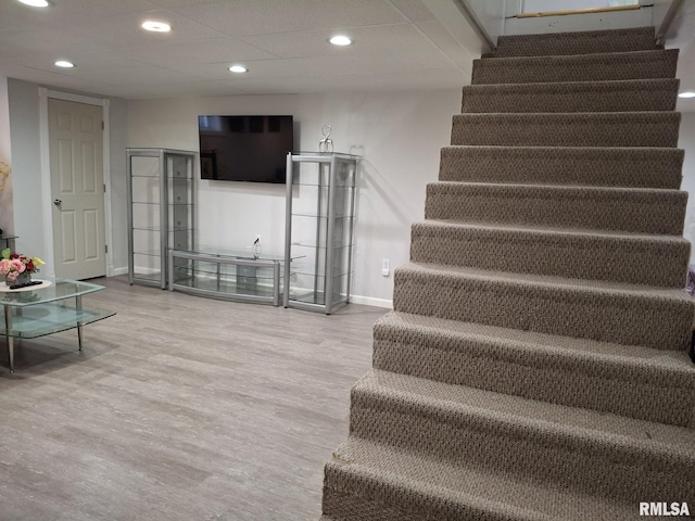 2604 W Kansas St, Peoria, IL 61604 - staircase featuring wood finished floors and recessed lighting