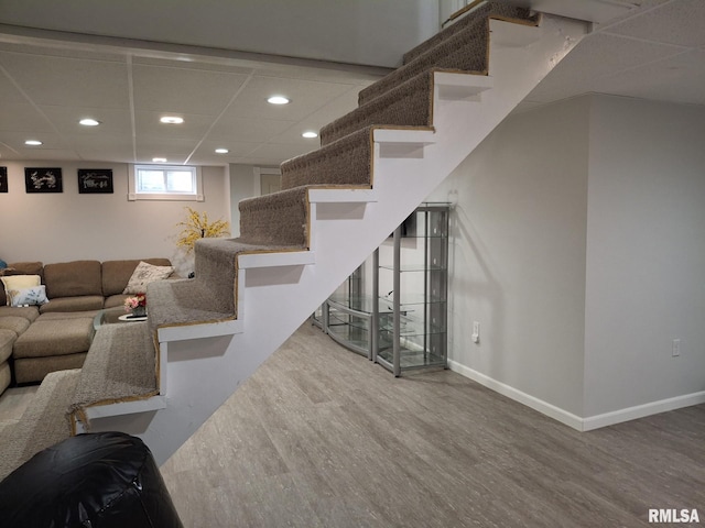 2604 W Kansas St, Peoria, IL 61604 - living area featuring wood finished floors, stairway, and recessed lighting