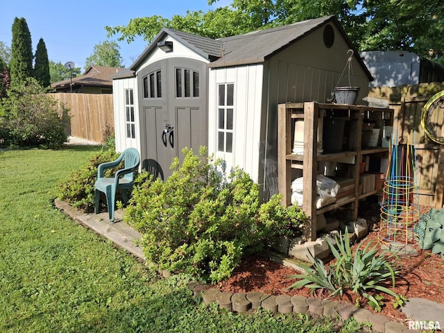 2604 W Kansas St, Peoria, IL 61604 - view of shed featuring a fenced backyard