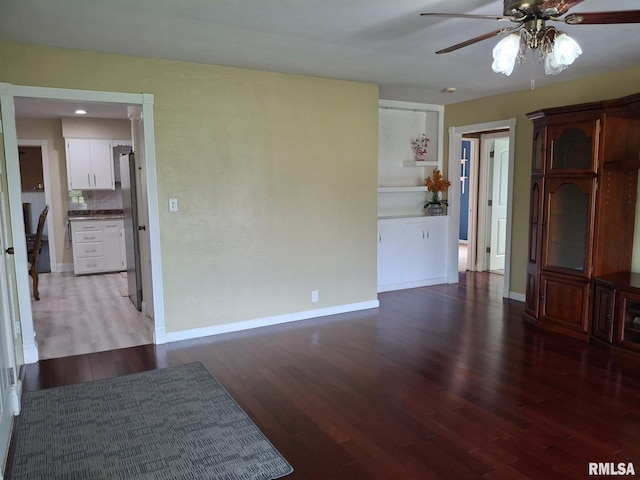 2604 W Kansas St, Peoria, IL 61604 - spare room with a ceiling fan and wood finished floors