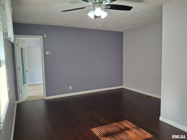 2604 W Kansas St, Peoria, IL 61604 - spare room featuring wood finished floors and a ceiling fan