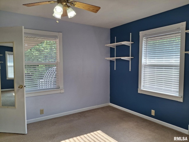 2604 W Kansas St, Peoria, IL 61604 - unfurnished room with a ceiling fan, carpet floors, and healthy amount of natural light