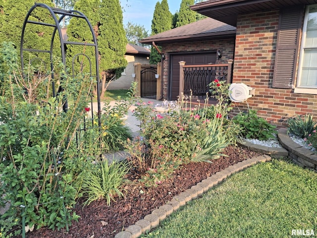 2604 W Kansas St, Peoria, IL 61604 - view of yard featuring an attached garage
