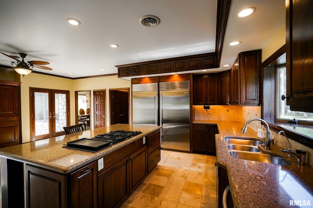 241 Birch Pl, Kewanee, IL 61443 - kitchen featuring stainless steel built in fridge, black gas cooktop, a ceiling fan, ornamental molding, and recessed lighting