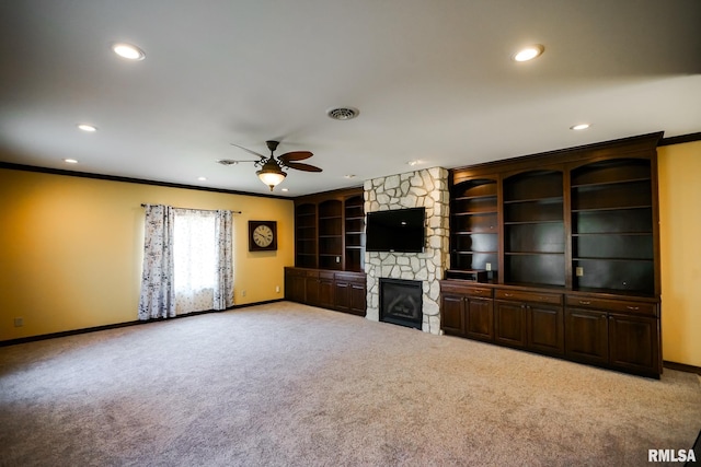 241 Birch Pl, Kewanee, IL 61443 - unfurnished living room featuring carpet floors, a ceiling fan, ornamental molding, a fireplace, and recessed lighting