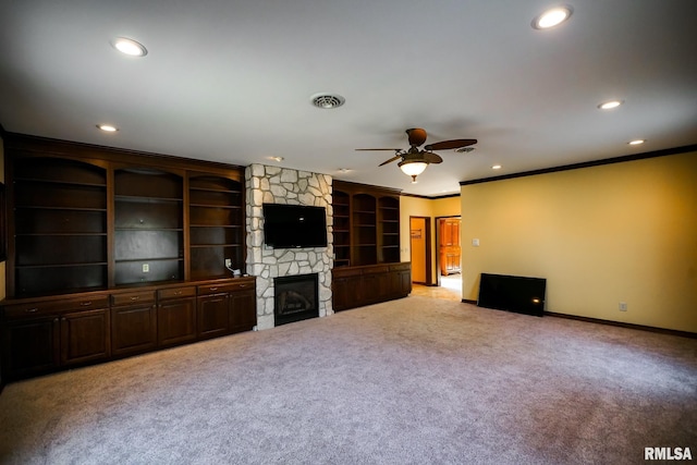 241 Birch Pl, Kewanee, IL 61443 - unfurnished living room with crown molding, light carpet, a ceiling fan, recessed lighting, and built in features