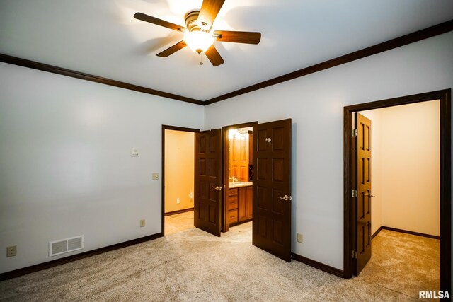 241 Birch Pl, Kewanee, IL 61443 - unfurnished bedroom featuring light colored carpet, ornamental molding, and ceiling fan