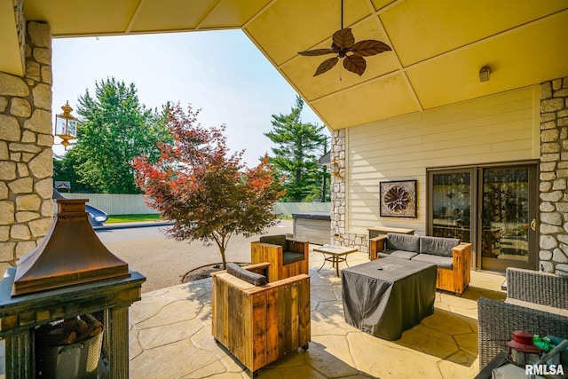 241 Birch Pl, Kewanee, IL 61443 - view of patio / terrace featuring an outdoor living space, a hot tub, and a ceiling fan