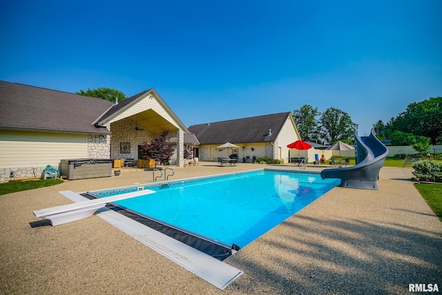 241 Birch Pl, Kewanee, IL 61443 - view of pool featuring a water slide, a patio, and a diving board