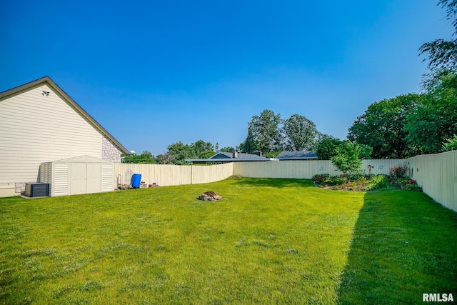 241 Birch Pl, Kewanee, IL 61443 - fenced backyard featuring a shed