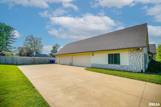 241 Birch Pl, Kewanee, IL 61443 - view of property exterior featuring stone siding and a shingled roof
