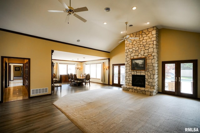 241 Birch Pl, Kewanee, IL 61443 - living area featuring french doors, ceiling fan, dark wood-style floors, recessed lighting, and a stone fireplace