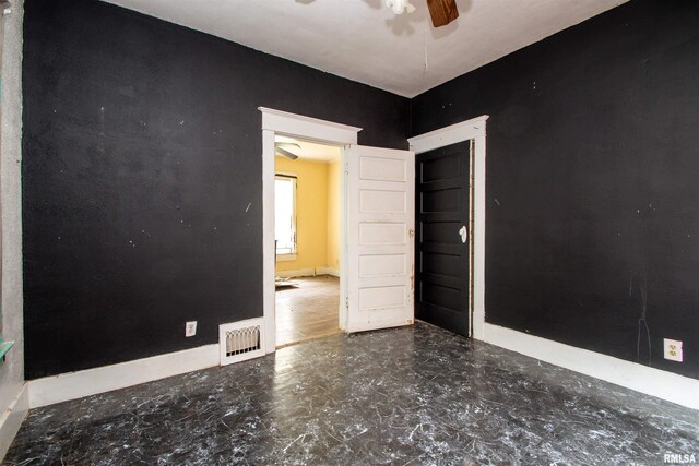 7113 S Depot St, Bartonville, IL 61607 - spare room with ceiling fan and baseboards