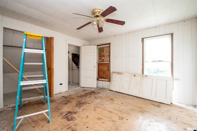 7113 S Depot St, Bartonville, IL 61607 - unfurnished bedroom with wood-type flooring and ceiling fan