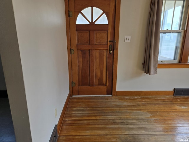 904 E Elm St, Canton, IL 61520 - entrance foyer with wood finished floors and baseboards