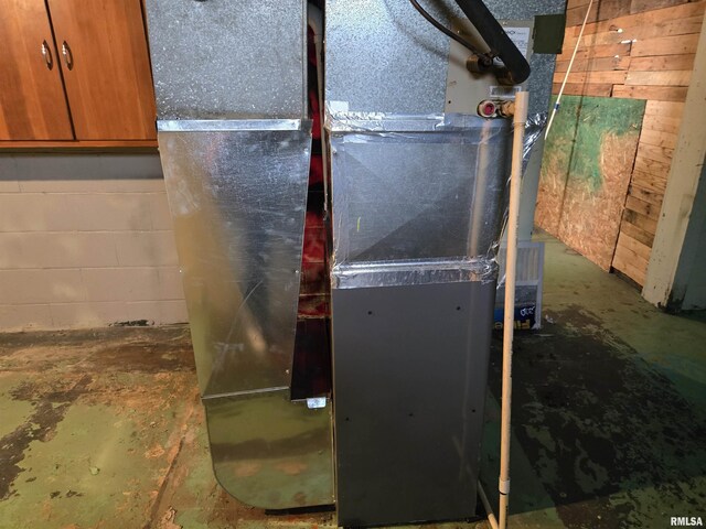 904 E Elm St, Canton, IL 61520 - utility room with heating unit