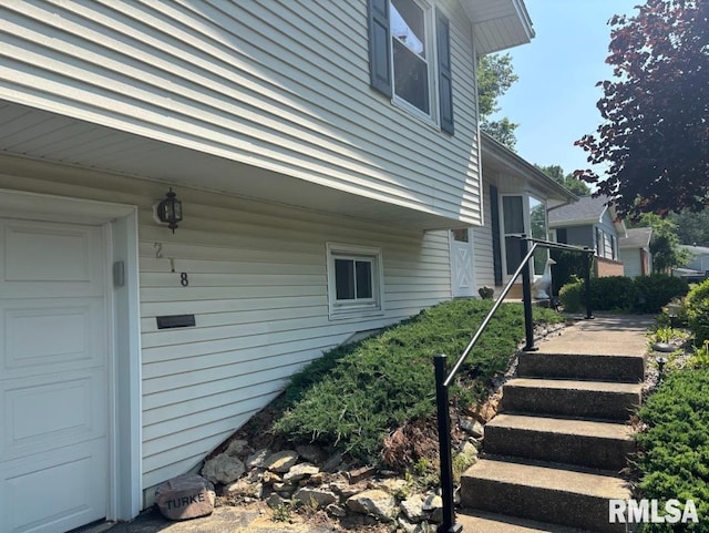 218 W Kurlene Dr, Macomb, IL 61455 - view of property exterior with a garage